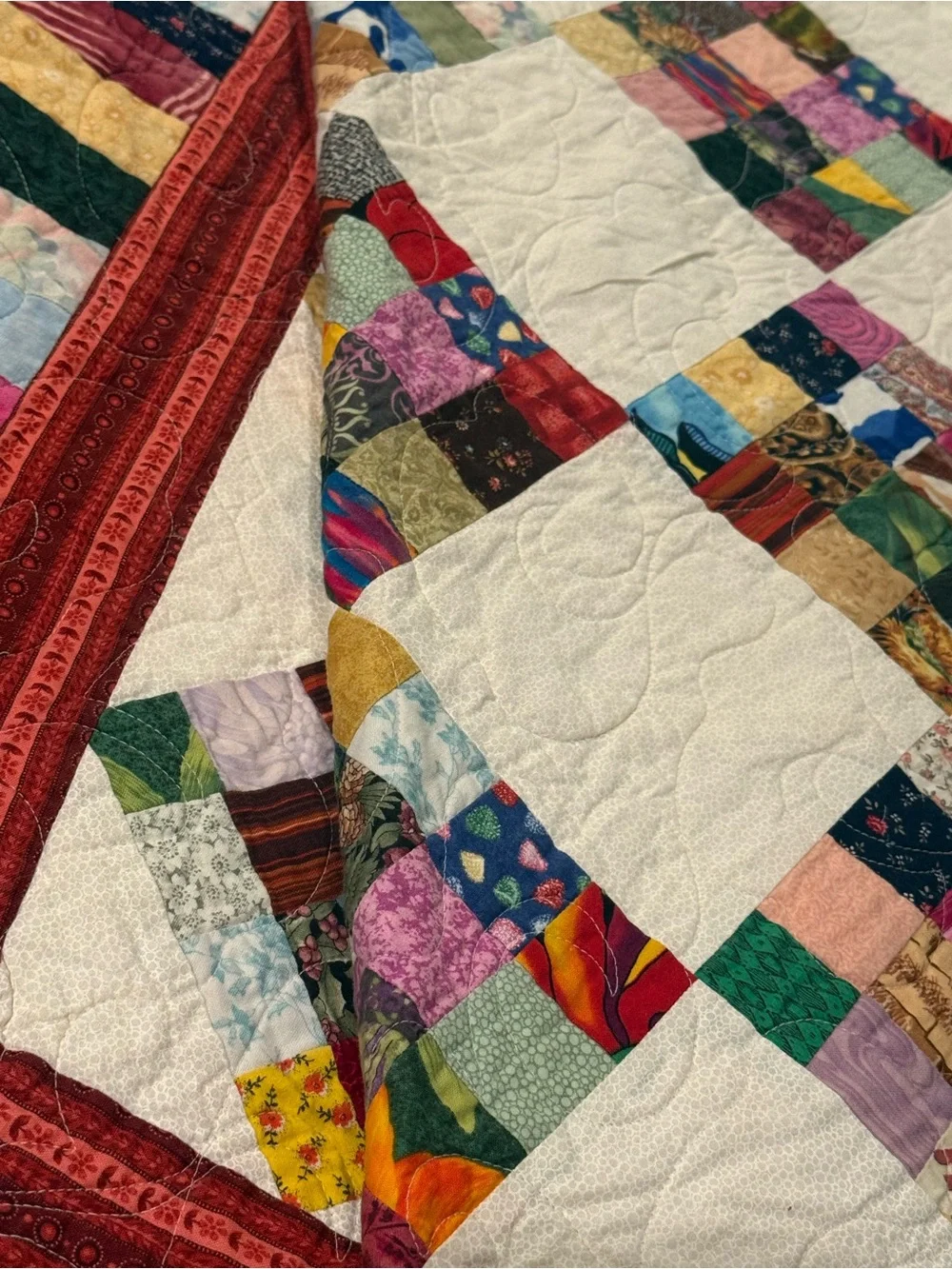 Vintage Multicolor Patchwork Quilt with Red Border